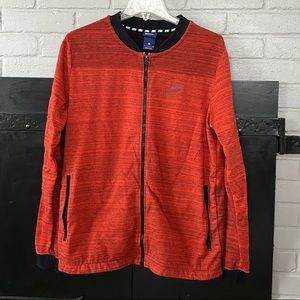 Nike zip up large men’s sweatshirt dark orange black collar and zipper.